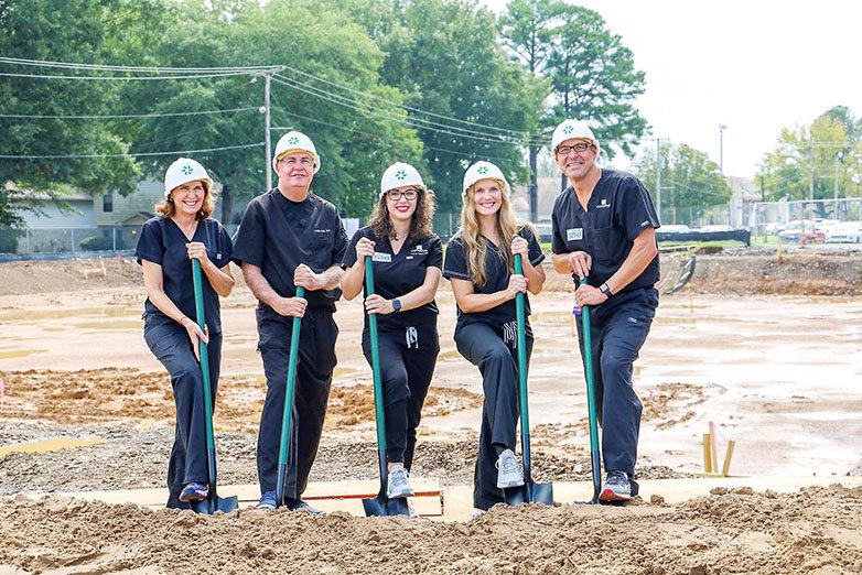Conway Obstetrics and Gynecology Clinic Drs. Carole Jackson, from left, Phillip Gullic, Lauren Nolen, Keitha Holland and Andrew Cole participate in the groundbreaking of a $13 million three-story medical-office building on the northeast corner of the Conway Regional Medical Center campus. The obstetrics-gynecology clinic will be on the third floor of the building, which is estimated to be completed in fall 2020.