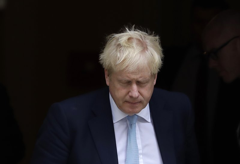 Britain's Prime Minister Boris Johnson leaves Downing Street to attend Parliament in London, Thursday, Oct. 3, 2019. The U.K. offered the European Union a proposed last-minute Brexit deal on Wednesday that it said represents a realistic compromise for both sides, as British Prime Minister Boris Johnson urged the bloc to hold &quot;rapid negotiations towards a solution&quot; after years of wrangling. (AP Photo/Kirsty Wigglesworth)