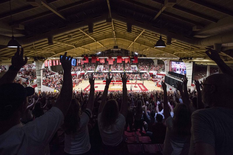 Fans call the Hogs on Saturday, Oct. 5, 2019, during the annual Arkansas Red-White Game at Barnhill Arena in Fayetteville.