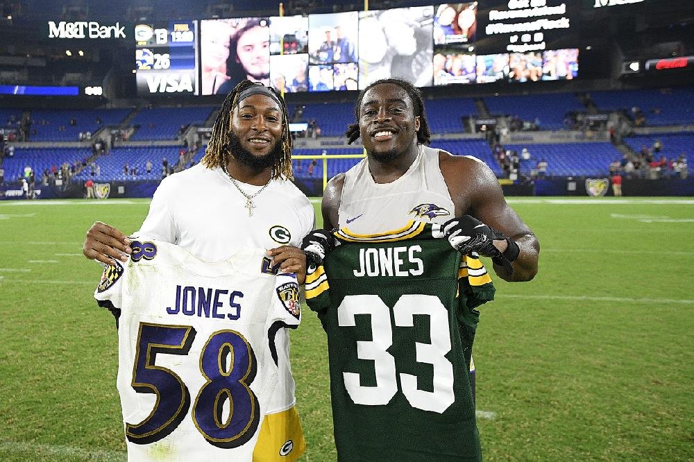 Green Bay Packers running back Aaron Jones (33) poses for a