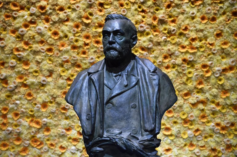 FILE - In this Monday, Dec. 10, 2018 file photo, a bust of the Nobel Prize founder, Alfred Nobel on display at the Concert Hall during the Nobel Prize award ceremony in Stockholm. Controversy stalks the Nobel prizes for peace and literature in a way it rarely does for science. The revamped panel at the Swedish Academy who will hand out the Nobel literature prizes Thursday Oct. 10, 2019, for both 2018 and 2019 would relish arguments about the winners, rather than intrigue about the #MeToo scandal that forced the institution to suspend the prize last year. (Henrik Montgomery/Pool Photo via AP, File) story.lead_photo.caption