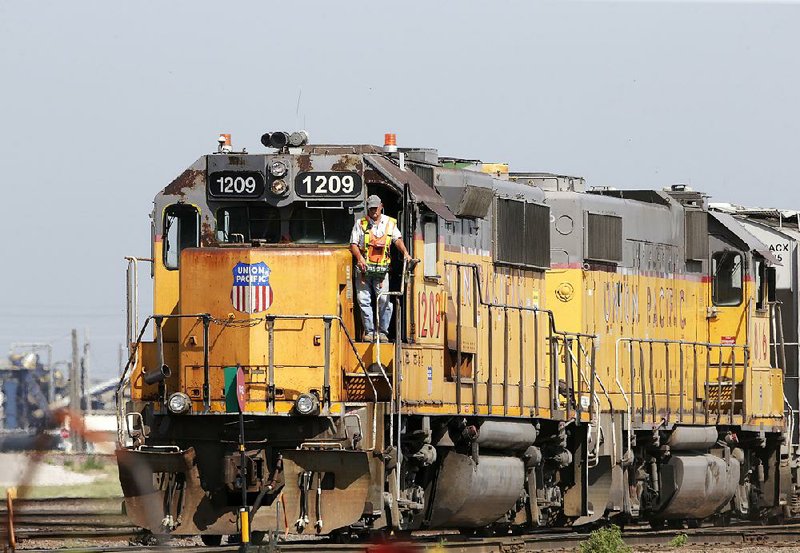 Union Pacific Corp. is among three major U.S. railroads projected to see increases in third-quarter earnings over last year, despite an industrywide drop in shipments. 