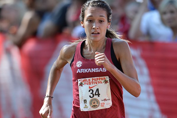 Arkansas' Taylor Werner comes in to the finish line Saturday, Oct. 5, 2019, to win the collegiate women's race during the Chile Pepper Cross Country Festival at Agri Park in Fayetteville.