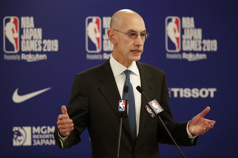 NBA Commissioner Adam Silver speaks at a news conference before an NBA preseason basketball game between the Houston Rockets and the Toronto Raptors Tuesday, Oct. 8, 2019, in Saitama, near Tokyo.