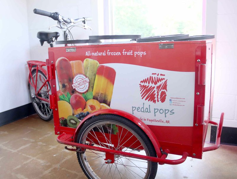 Mike Thompson started his business, Pedal Pops, using tricycles and riding them around Bentonville to sell all-natural frozen fruit pops. He still uses the tricycles on occasion.