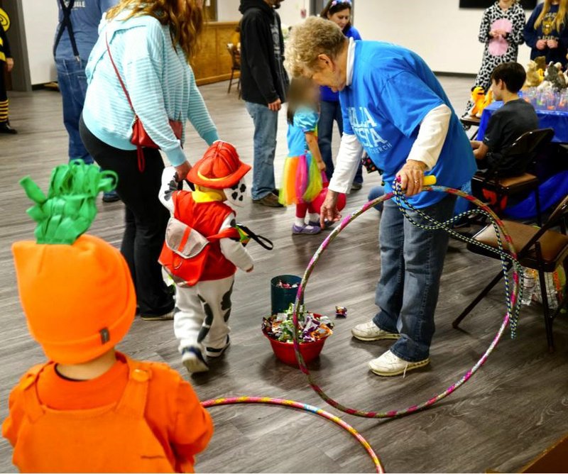 Photo submitted Last year's Trunk or Treat was fun for all of the kids and church volunteer Jody Rogers who gave out treats.