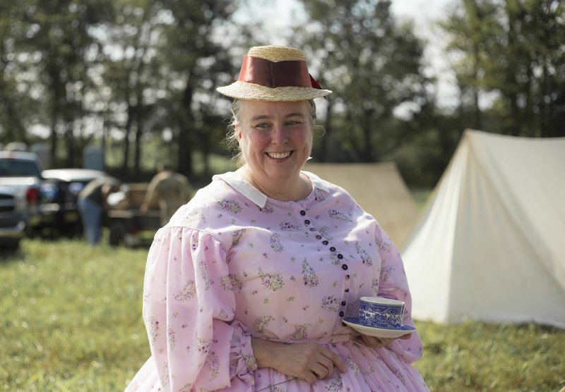 NWA Democrat-Gazette photographs by Charlie Kaijo Joli Lewis of Joplin, Mo. looked on, Friday, Oct. 4, 2019, is a seamstress who created her entire outfit by hand including her corset, cage and two starch petty coats.