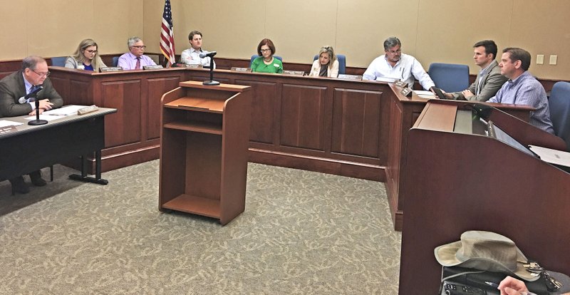 NWA Democrat-Gazette/MIKE JONES Bentonville's City Council worked through a light agenda Tuesday night. The council agreed to accept a $1.9-million Walton Family Foundation grant to help pay for design and redesign work for street projects.