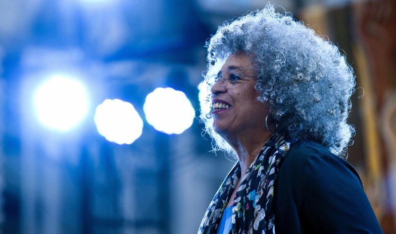 Political activist Angela Davis appears on the stage during an open air rally in front of the University of the Republic, in Montevideo, Uruguay, Saturday, March 23, 2019. Davis received a Honoris Causa Doctorate degree from the Uruguayan university. 