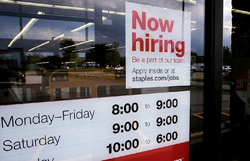 U.S. job openings  fell  in August  to  the  lowest  level since March  2018, although the number of job openings still outnumbers  the number of people looking for work at businesses like this Staples store in Manchester, N.H. 