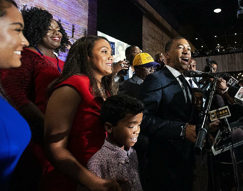 Steven Reed (right), mayor-elect of Montgomery, Ala., said Tuesday’s election was “about all of the hopes and dreams that we have as individuals and collectively in the city.” 