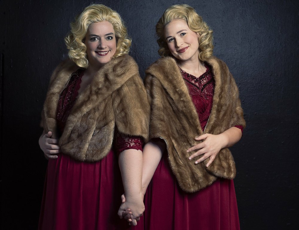Erin Martinez Warner (left) and Sarah Haman play conjoined twins Daisy and Violet Hilton in ìSide Show,î opening Oct. 11 at The Weekend Theater.
Photo Credit: Wendy Kelley