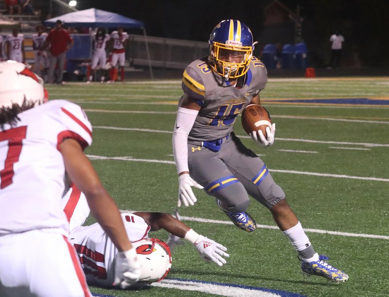 Lakeside running back Dealond Lewis turns upfield on a run against Camden Fairview on Sept. 27 at Lakeside's Chick Austin Field. The Rams travel to Texarkana to face the Razorbacks on Friday. - Photo by Richard Rasmussen of The Sentinel-Record