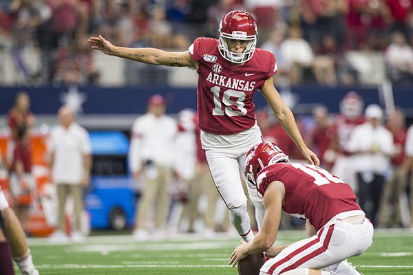 Arkansas kicker Connor Limpert attempts an extra point during a game against Texas A&M on Saturday, Sept. 28, 2019, in Arlington, Texas.