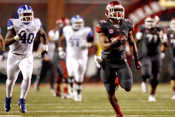 Arkansas running back Jonathan Williams runs with the ball during a touchdown reception against Kentucky on Saturday, Oct. 13, 2012, in Fayetteville. 