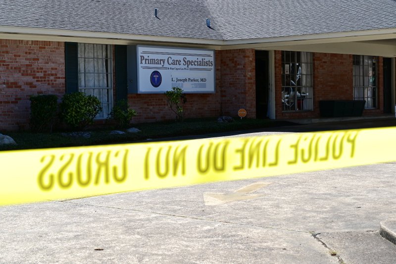 DEA and FBI agents search Primary Care Specialists at the intersection of 24th and County Avenue on Tuesday, October 8, 2019, in Texarkana, Ark.