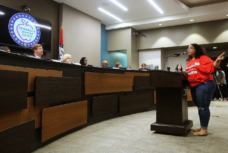 Kimberly Crutchfield, a teacher at Central High, speaks Thursday at the state Board of Education meeting about her experience as a teenage mother whose family gave her no support but her principal and teachers made sure she went to school.