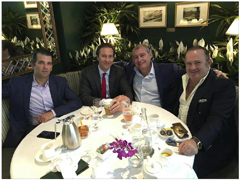 A Facebook screen grab provided by the Campaign Legal Center shows (from left) Donald Trump Jr., Tommy Hicks Jr., Lev Parnas and Igor Fruman in a post from May 21, 2018. Parnas and Fruman, associates of Rudy Giuliani, were charged Thursday with federal campaign finance violations related to a $325,000 donation to a group supporting President Donald Trump’s reelection campaign. 