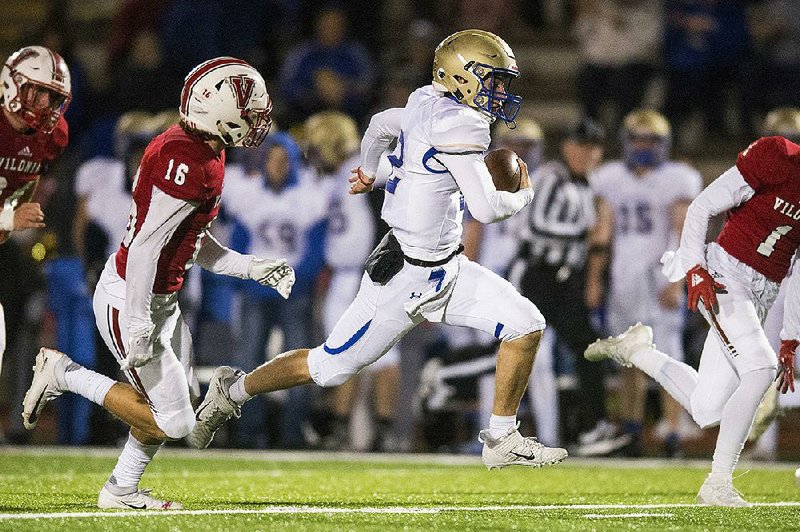 Harrison quarterback Ben Johnson (middle) runs past the Vilonia defense Friday to score a 55-yard touchdown during the Goblins’  17-15 victory over the Eagles in Vilonia. More photos are available at arkansasonline.com/1012harrison/. 