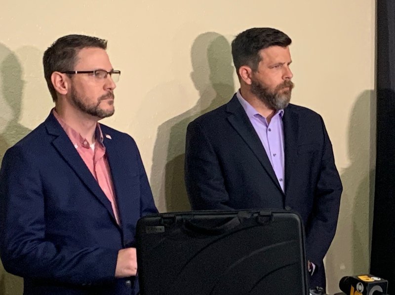 NWA Democrat-Gazette/MARY JORDAN Josh Bryant, nonprofit attorney, (left), and Justin Heimer, adoption attorney, at a press conference at Shared Beginnings in Fayetteville.