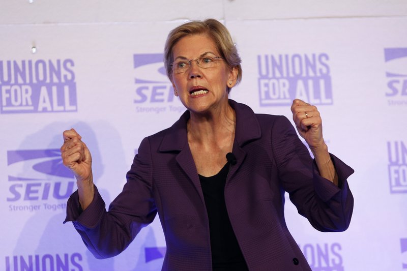 FILE - In this Oct. 4, 2019 file photo, Democratic presidential candidate Sen. Elizabeth Warren, D-Mass., speaks at the SEIU Unions For All Summit in Los Angeles. For 41 years, federal law has banned pregnancy discrimination in the workplace. But the stories tumbling out this week show it&#x2019;s far from eradicated. Prompted by Warren&#x2019;s claim that she was forced out of a teaching job in 1971 because she was pregnant, scores of women have shared similar stories on social media. Police officers, academics, fast food workers, lawyers, flight attendants and others say they hid pregnancies on the job or during interviews, faced demotion or demeaning comments and were even fired after revealing a pregnancy.(AP Photo/Ringo H.W. Chiu, File)