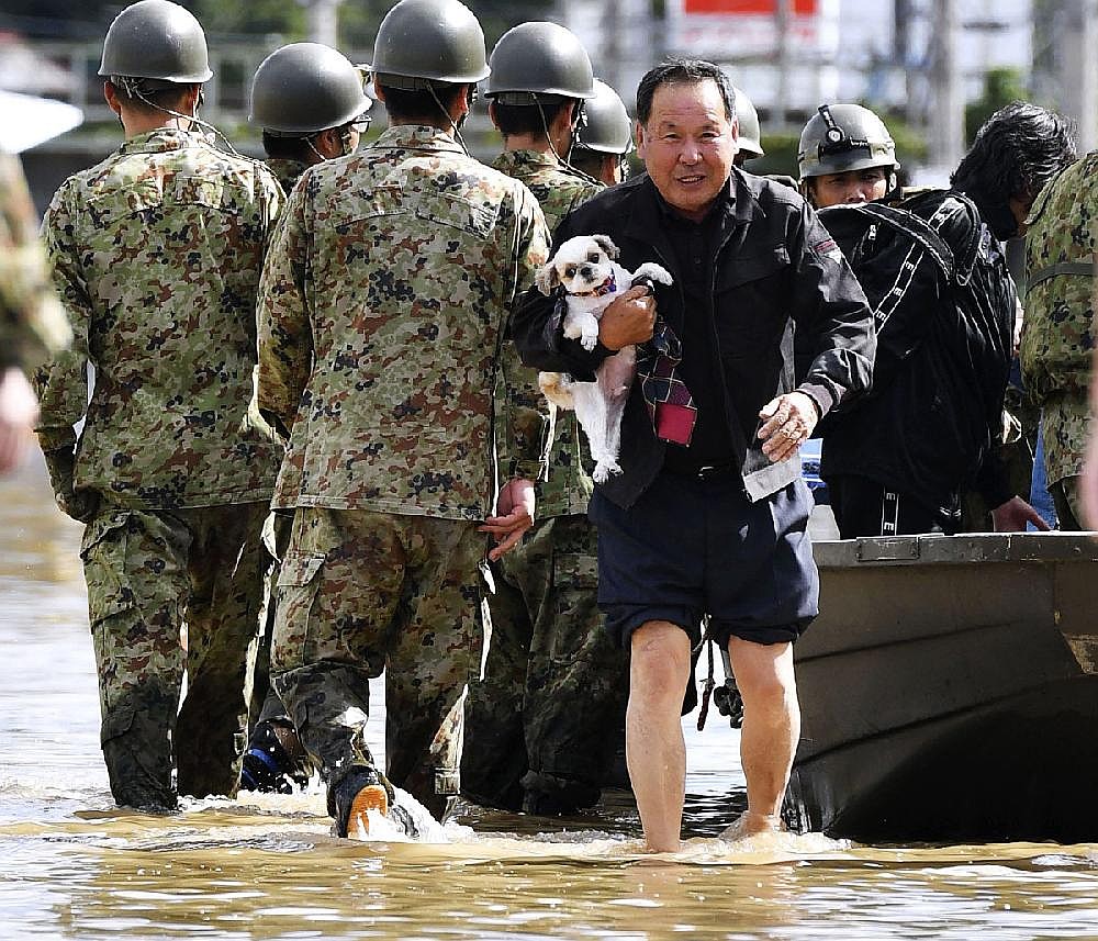 Rescuers deployed in storm-hit Japan | Northwest Arkansas Democrat-Gazette