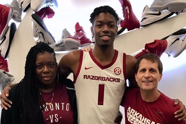 ESPN 4-star Keon Ambrose-Hylton, his mother and Arkansas men's basketball coach Eric Musselman.	