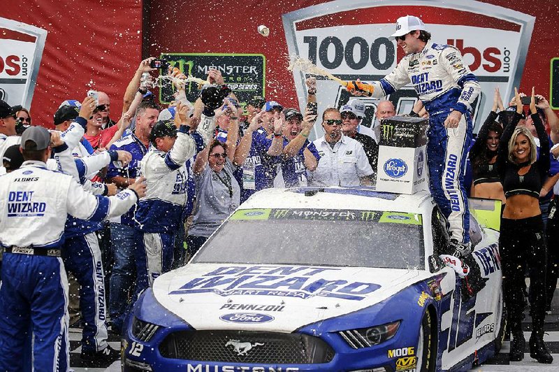 Ryan Blaney celebrates in victory lane after winning the NASCAR Monster Energy Cup Series race at Talladega Superspeedway on Monday in Talladega, Ala.