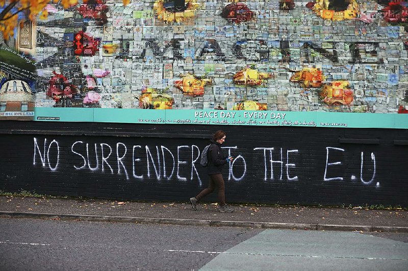 Pro-Brexit graffiti Tuesday adorns a wall that separates a Protestant area from a Catholic area of West Belfast, Northern Ireland. 