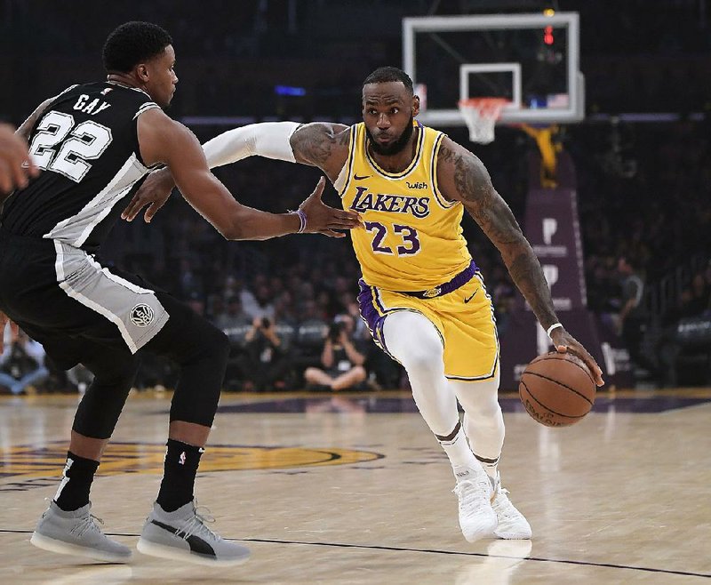 LeBron James (right) of the Los Angeles Lakers received criticism in multiple forms after comments he made Monday regarding Daryl Morey’s deleted tweet showing support for pro-democracy protests in Hong Kong.