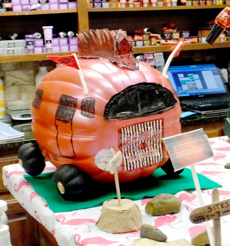 Lynn Atkins/The Weekly Vista A Razorback RV is ready for tailgating at the Bella Vista Beauty Salon annual pumpkin decorating contest.