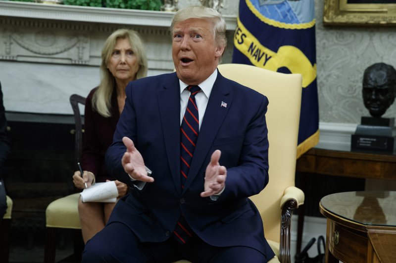 President Donald Trump speaks during a meeting with Italian President Sergio Mattarella in the Oval Office of the White House, Tuesday, Oct. 15, 2019, in Washington. (AP Photo/Evan Vucci)

