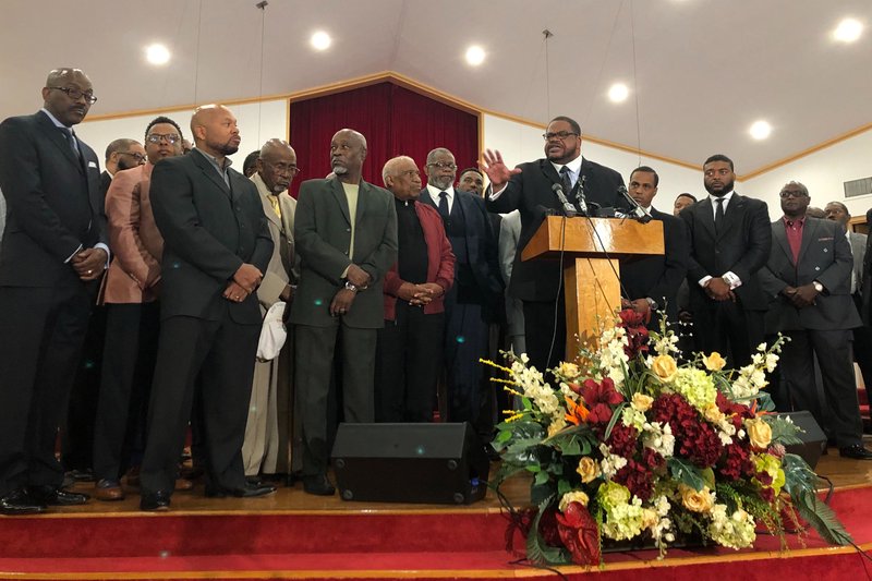 Pastor Kyev Tatum speaks at a news conference at a church to a group of community leaders on Wednesday, Oct. 16, 2019, in Fort Worth, Texas, who are calling for a plan overseen by a federal judge to reform the Fort Worth Police Department. This comes after the fatal shooting of a 28-year-old woman in her home over the weekend in Fort Worth. (AP Photo/Jamie Stengle)