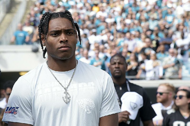 Jacksonville Jaguars cornerback Jalen Ramsey stands on the sideline during the playing of the national anthem before an NFL football game against the New Orleans Saints Sunday, Oct. 13, 2019, in Jacksonville, Fla. 