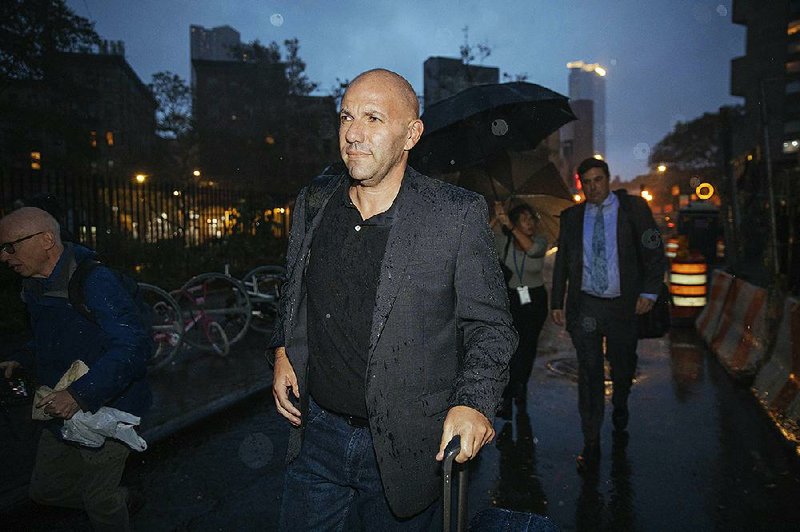 David Correia leaves federal court Wednesday in New York after he surrendered at Kennedy Airport. 