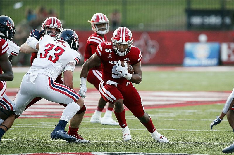 Running back Trey Ragas (9) leads Louisiana-Lafayette’s rushers this  season with 572 yards on 63 carries, averaging 9.1 yards per  carry, entering tonight’s game against Arkansas State. 