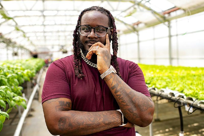 This June photo shows rapper T-Pain, winner of the first season of Fox’s The  Masked Singer and host of T-Pain’s School of Business, at Gotham Greens in Brooklyn, N.Y. The program explores niche, innovative businesses founded by millennials. 