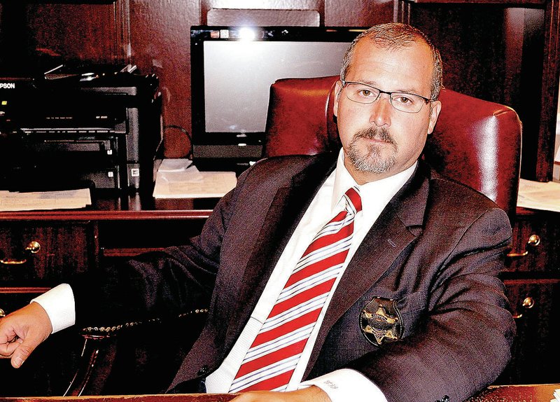 Rachel Dickerson/McDonald County Press File Photo William "B.J." Goodwin III serves as McDonald County Coroner. The coroner's position is one that keeps Goodwin stretched from one end of the county to the other. From the corner of Southwest City to a spot near Wheaton, McDonald County is a large area to service, Goodwin said. He tries to respond to any situation within 30 minutes, he added. His office is based at the Ozark Funeral Home in Anderson.