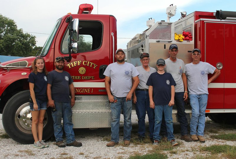 MEGAN DAVIS/MCDONALD COUNTY PRESS Keisha Clark, Nate Walter, John Moore, Assistant Chief Richard Huston, apprentice Case Hustin, Scott Huston and Dewey Pierce volunteer on the Tiff City Fire Department.