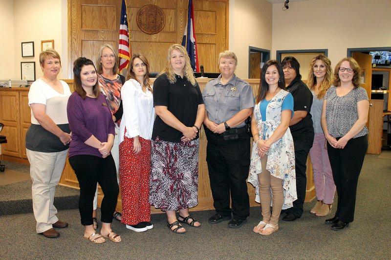 MEGAN DAVIS/MCDONALD COUNTY PRESS The McDonald County Courthouse staff, working behind-the-scenes on court cases from filing to sentencing includes (from left to right) Carrie Mileson, Athena Thacker, Lori Sellers, Laura Williams, Circuit Clerk Tanya Lewis, Bailiff Stephanie Sweeten, Lacey Stancill, Jessie Bergen, Monica Willyard and Amy Campbell.