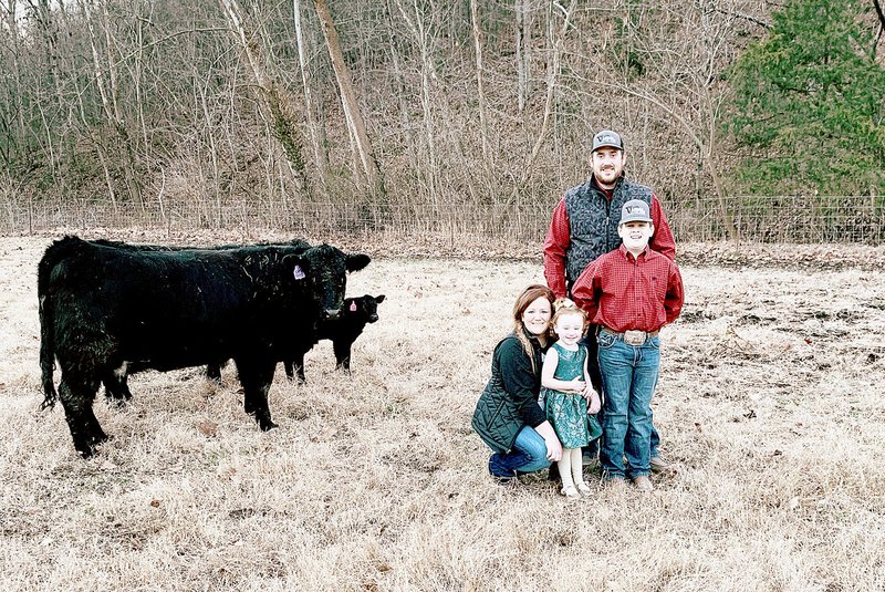 PHOTO SUBMITTED Tiffany and Ryan Lewis are pictured with daughter Payton and son Kole. They raise cattle on their farm in Pineville.