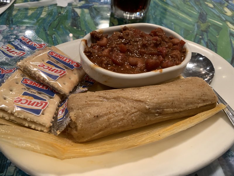 A single beef tamale is available, with chili and crackers, as an appetizer at Izzy's, off Cantrell Road in west Little Rock. Arkansas Democrat-Gazette/Eric E. Harrison



