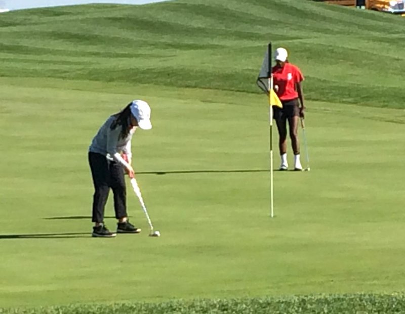 COURTESY PHOTO McDonald County's Lily Allman eyes a short putt while Carl Junction's Jenna Teeter looks on at the Missouri Class 2 Girls Golf Sectional 3 Championships held on Oct. 14 at Hoots Hollow at Center Creek in Pleasant Hill. Allman shot a 79 to win the individual title.