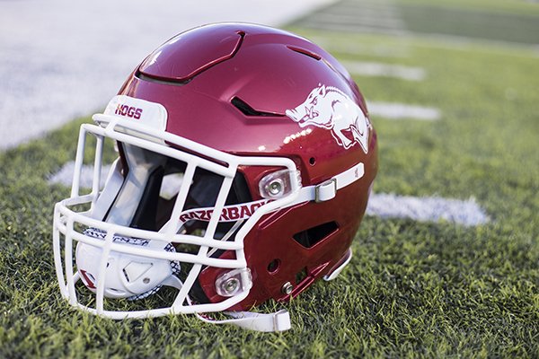 An Arkansas football helmet sits on the ground prior to a game between the Razorbacks and Kentucky on Saturday, Oct. 12, 2019, in Lexington, Ky. 