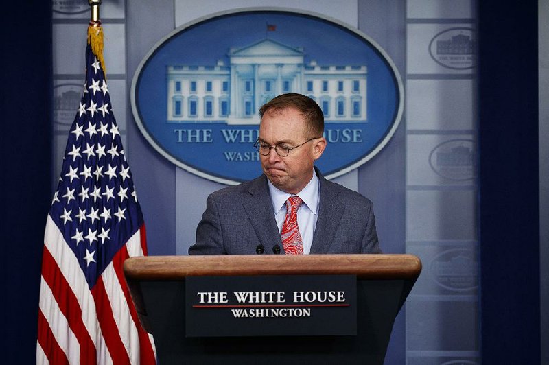 Mick Mulvaney, acting White House chief of staff, gave conflicting statements Thursday about why millions in military aid to Ukraine was held up in 2016. More photos at arkansasonline.com/1018briefing/ 