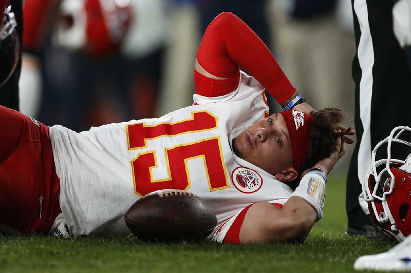 AP/DAVID ZALUBOWSKI
Kansas City Chiefs quarterback Patrick Mahomes left Thursday night’s game against the Denver Broncos with a knee injury. The reigning NFL MVP did not return.