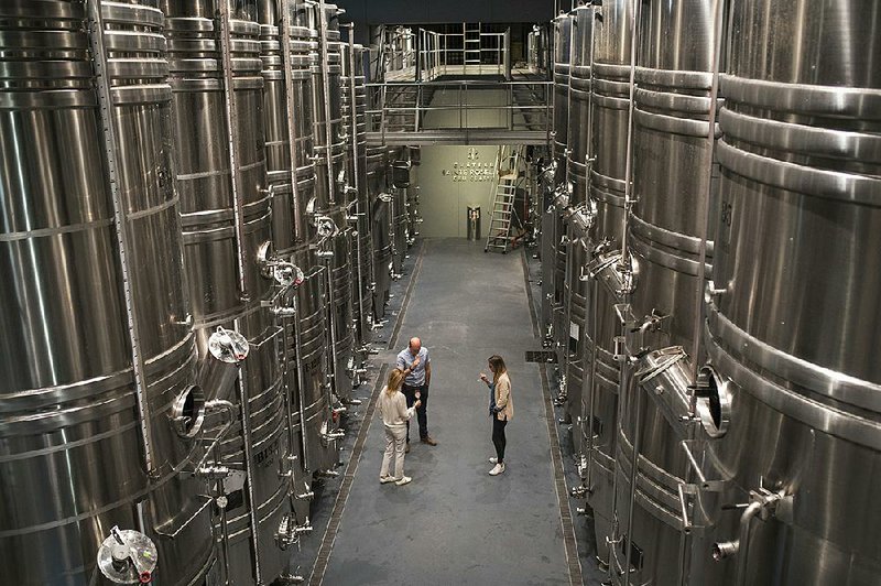 Winemakers sample rose last week in the production facility of the 700-year-old Chateau Sainte-Roseline winery in the Provence region of southern France. French wine is included in new U.S. tariffs. 