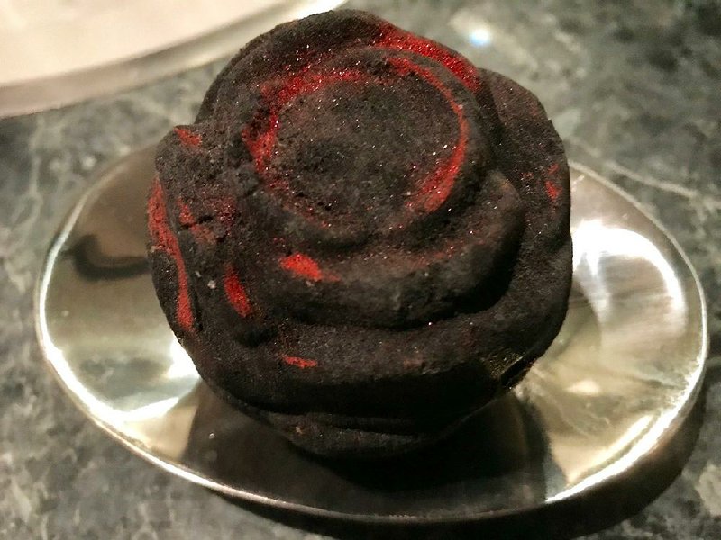 With its blend of rose and lemon oils, Lush Cosmetics’ Black Rose bath bomb looks and smells so good, you won’t want to use it in the tub ... you’ll want to use it for room decoration and aromatherapy. 