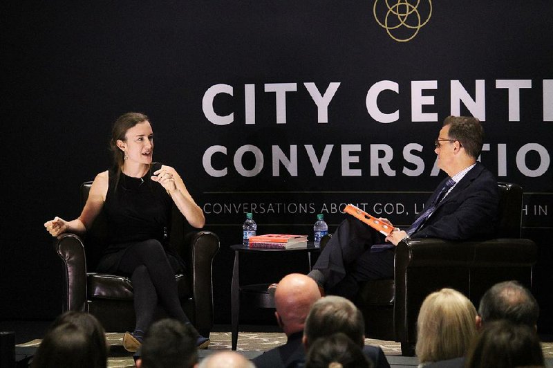 Rebecca McLaughlin and Dr. Steven Smith, senior pastor of Immanuel Baptist Church in Little Rock, discuss details of McLaughlin’s first book, Confronting Christianity, during the event series City Center Conversations at the city’s Robinson Center Performance Hall on Tuesday. 