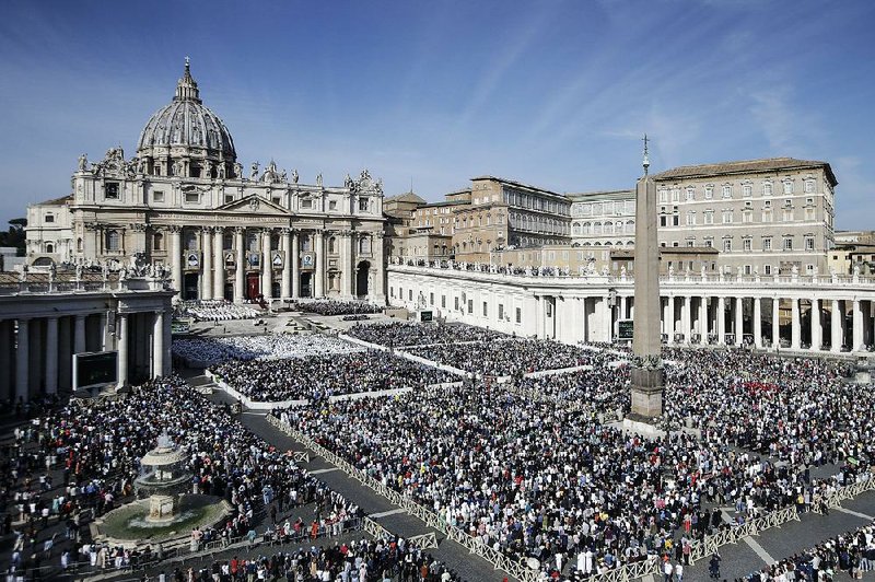 Faithful assemble Sunday in St. Peter’s Square at the Vatican where Pope Francis canonized Cardinal John Henry Newman. He was the 19th-century Anglican convert who became an immensely influential, unifying figure in the Anglican and Catholic churches. 